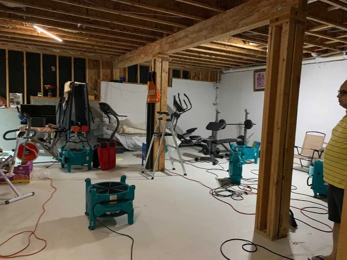 Basement drying equipment setup for Contents Cleaning & Restoration in Hartselle